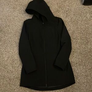 Women’s black workout style raincoat